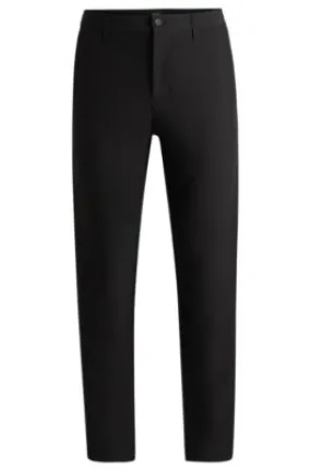 Pantalones regular fit de tejido elástico repelente al agua